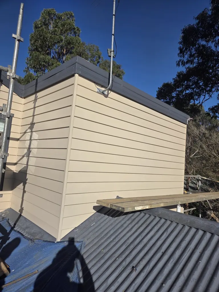 Completed weatherboard and gutter repaint