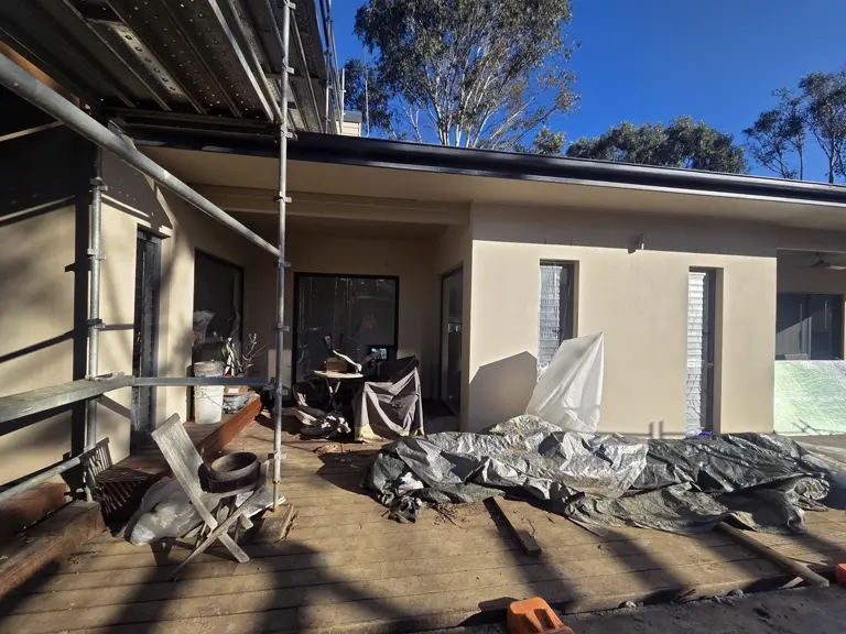 Exterior render repaint with dark window frames